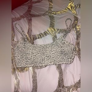 tan and black polka dot bikini top